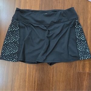 FILA BLACK ATHLETIC SKORT WITH TURQUOISE SIDE GEOMETRIC LASER CUT OUTS MEDIUM
